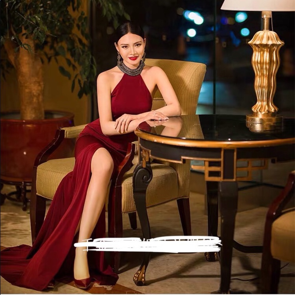 Stunning hand-sewn beaded high slit gown